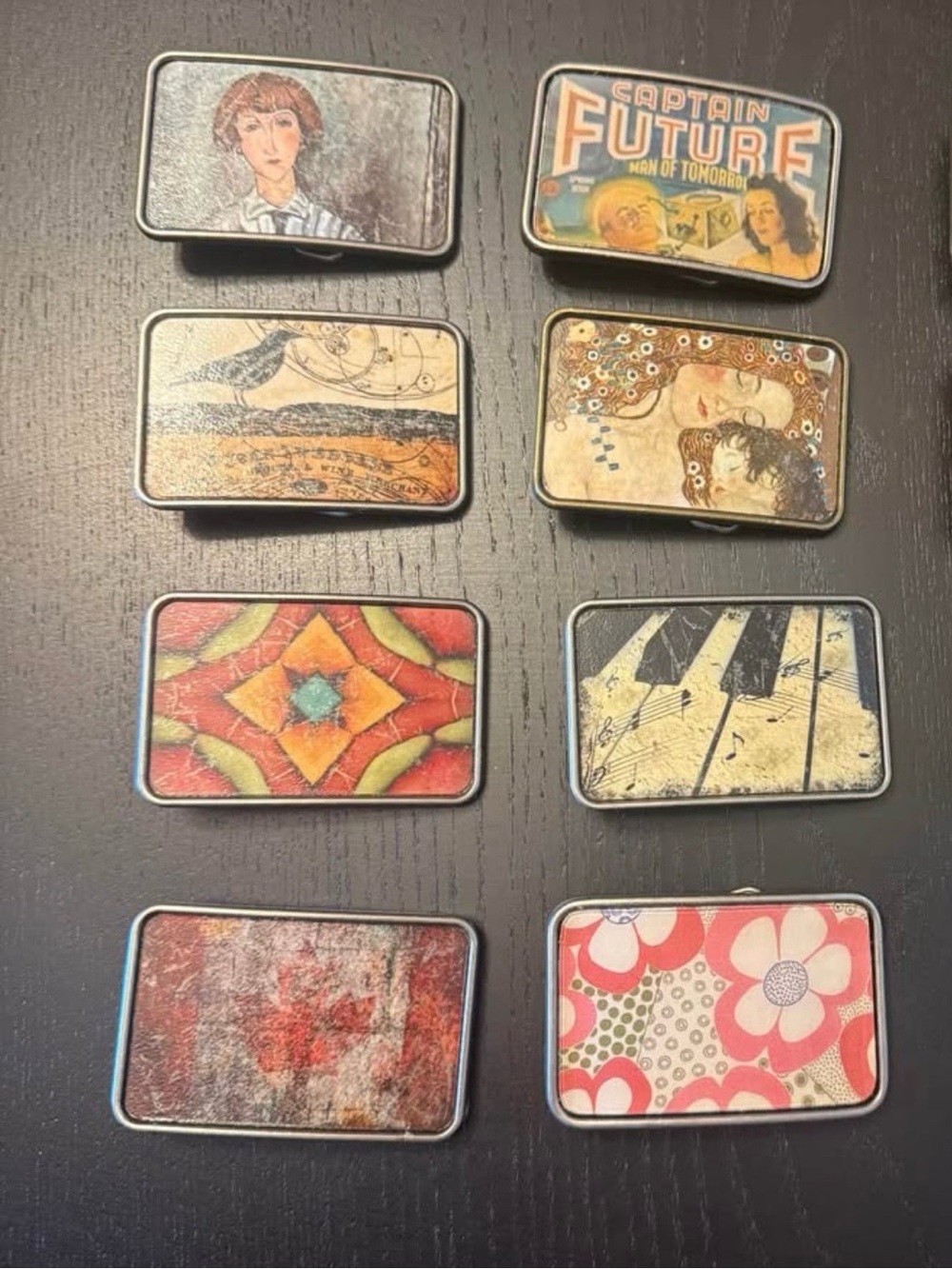 Artistic interchangeable belt buckle collection